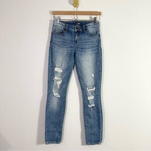 Fashion Nova Medium Wash Faded Blue Distressed Skinny Leg Jeans